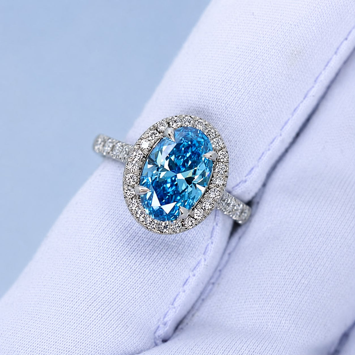 3.01ct Fancy vivid blue diamond halo ring