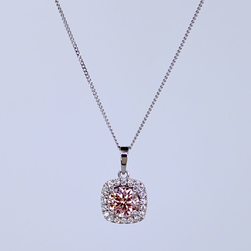 Pink diamond halo pendant