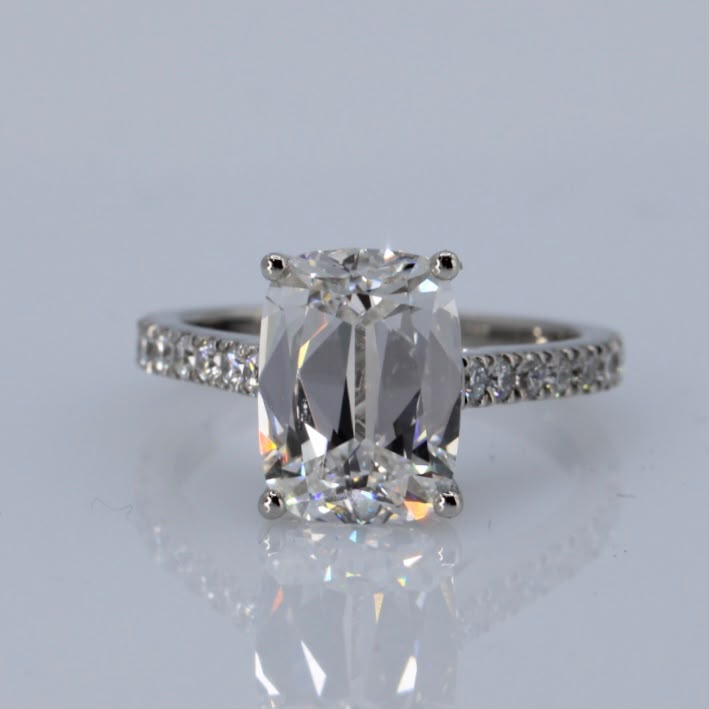 4.09ct Antique cushion-cut diamond ring with pavè band