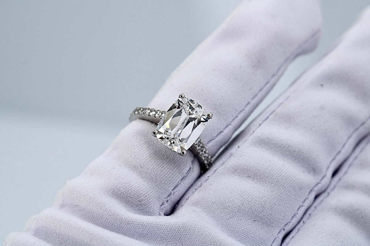4.09ct Antique cushion-cut diamond ring with pavè band