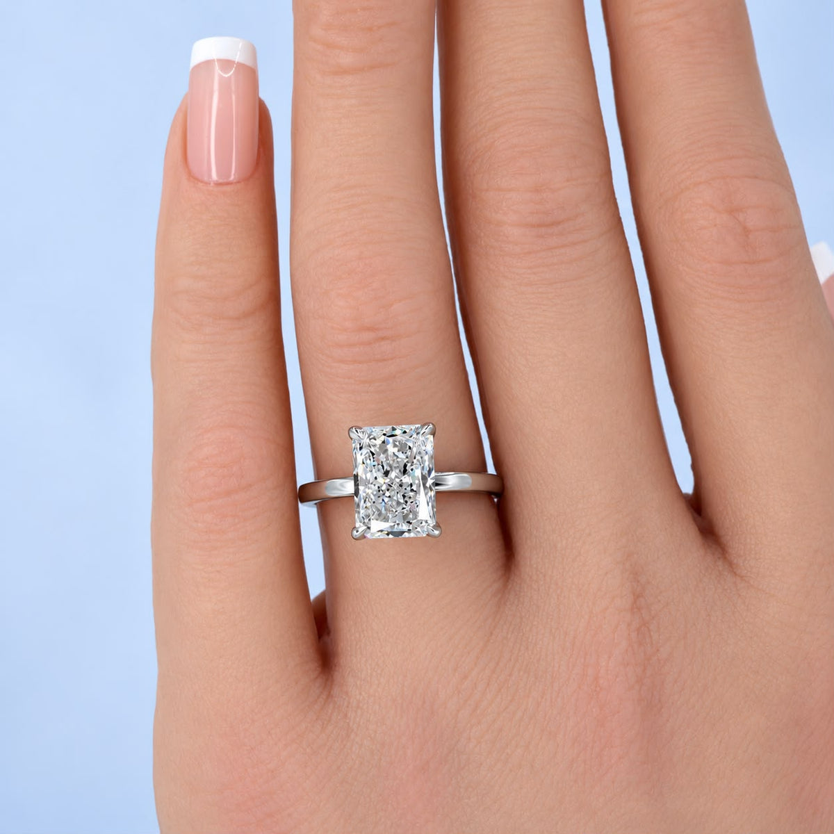 4.14ct radiant-cut solitaire diamond ring with hidden halo