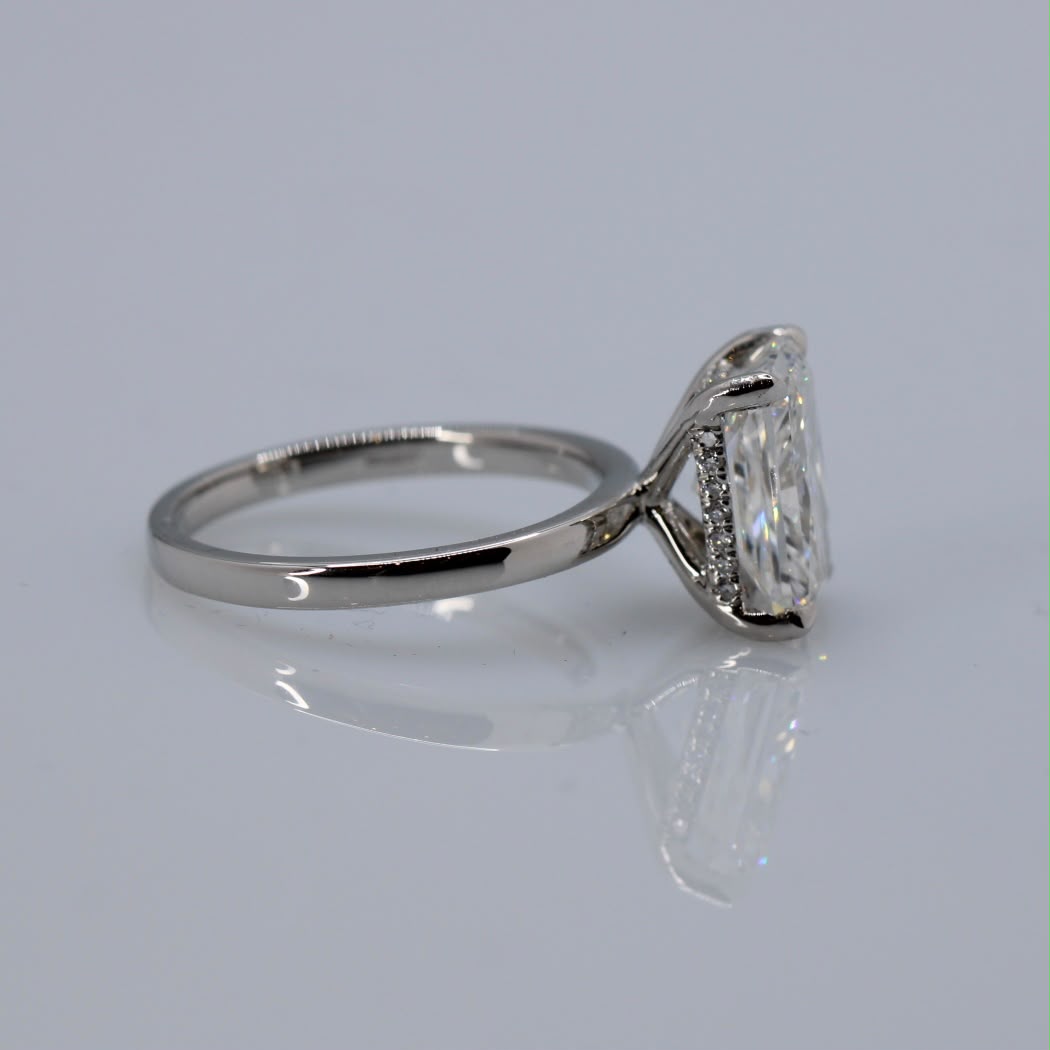4.14ct radiant-cut solitaire diamond ring with hidden halo