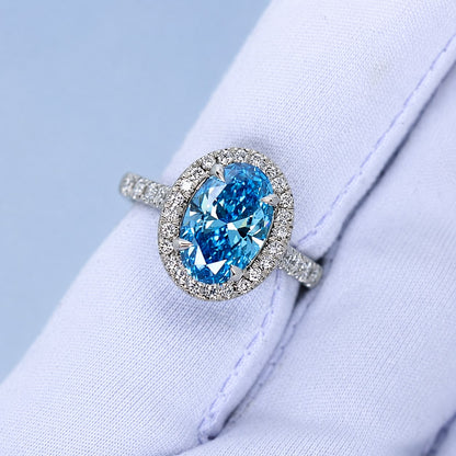 3.01ct Fancy vivid blue diamond halo ring