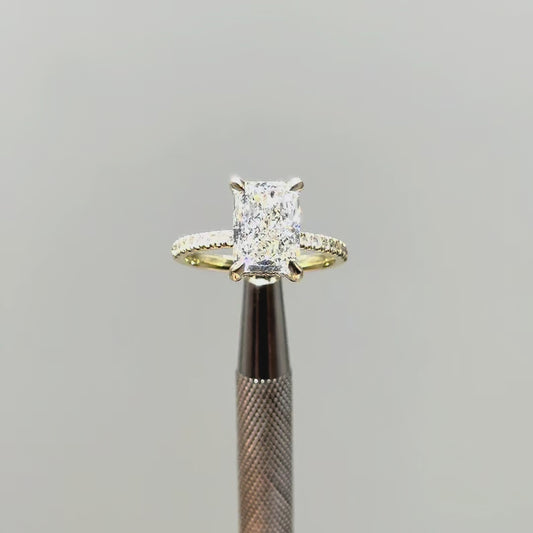 3.44ct Radiant cut diamond ring with pavè & hidden halo set in 18k yellow gold